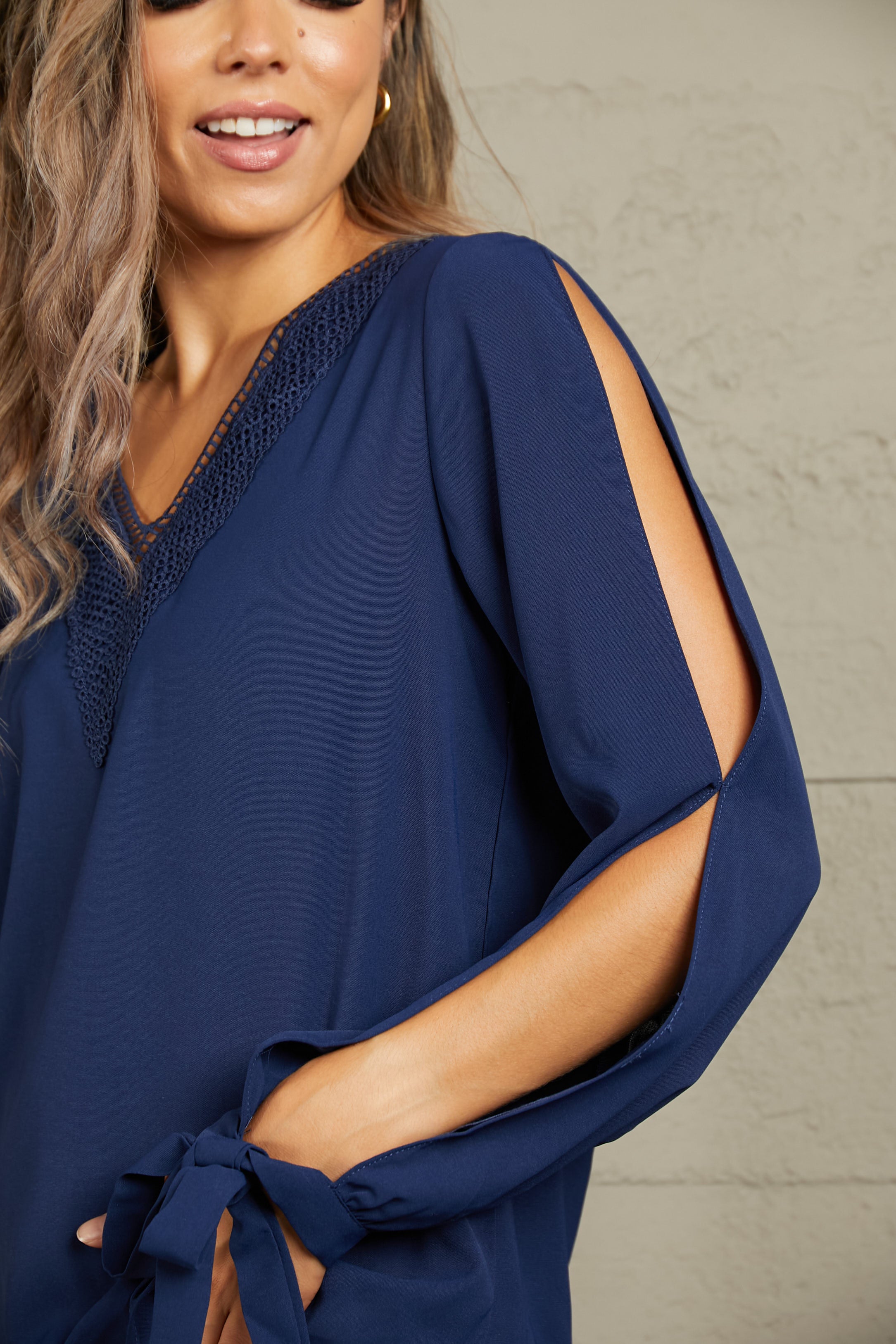 Perfee V-Neck Tie Cuff Slit Blouse – Trendsi | ClozArt