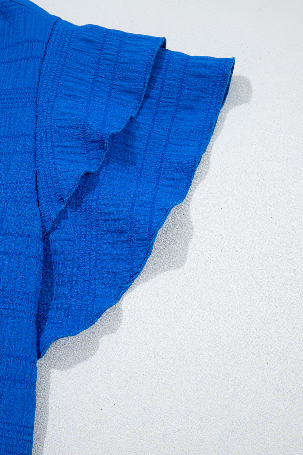 Dark Blue Ruffle Sleeve Textured Smocked Blouse – Shewin | ClozArt