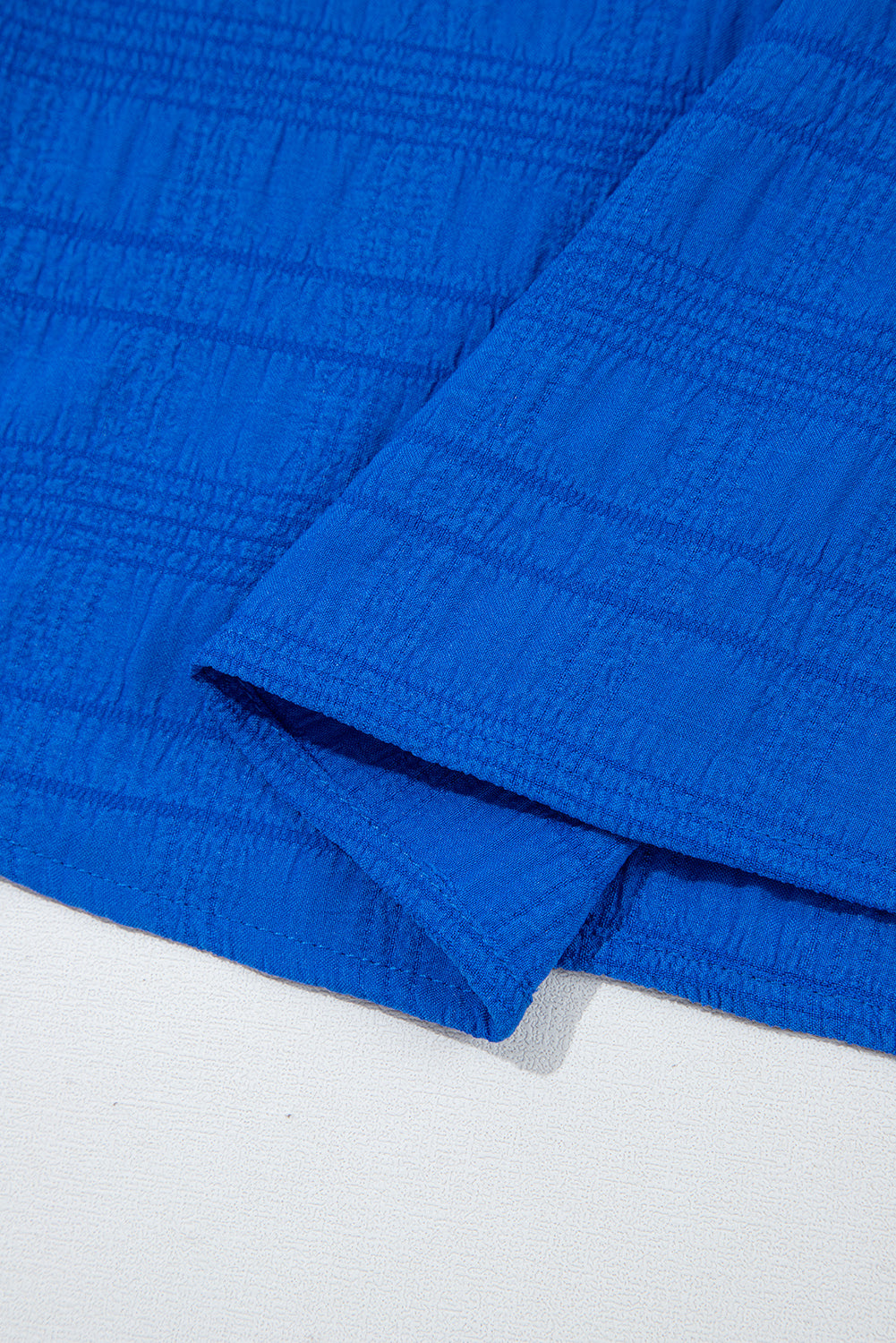 Dark Blue Ruffle Sleeve Textured Smocked Blouse – Shewin | ClozArt